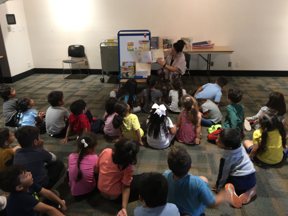 TK students enjoying story time at the public library